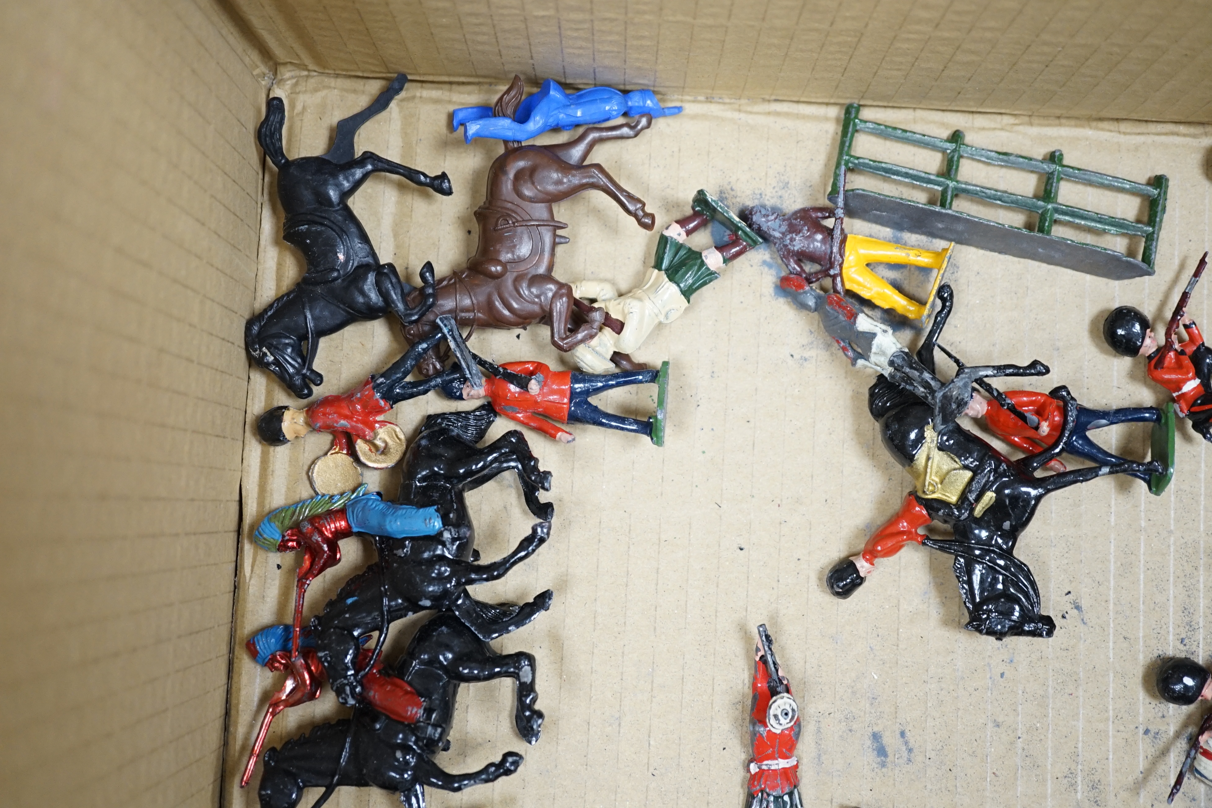 A collection of approx. fifty Britains lead soldiers, including; Cowboys and Indians, Bandsmen, Grenadier Guards, etc.